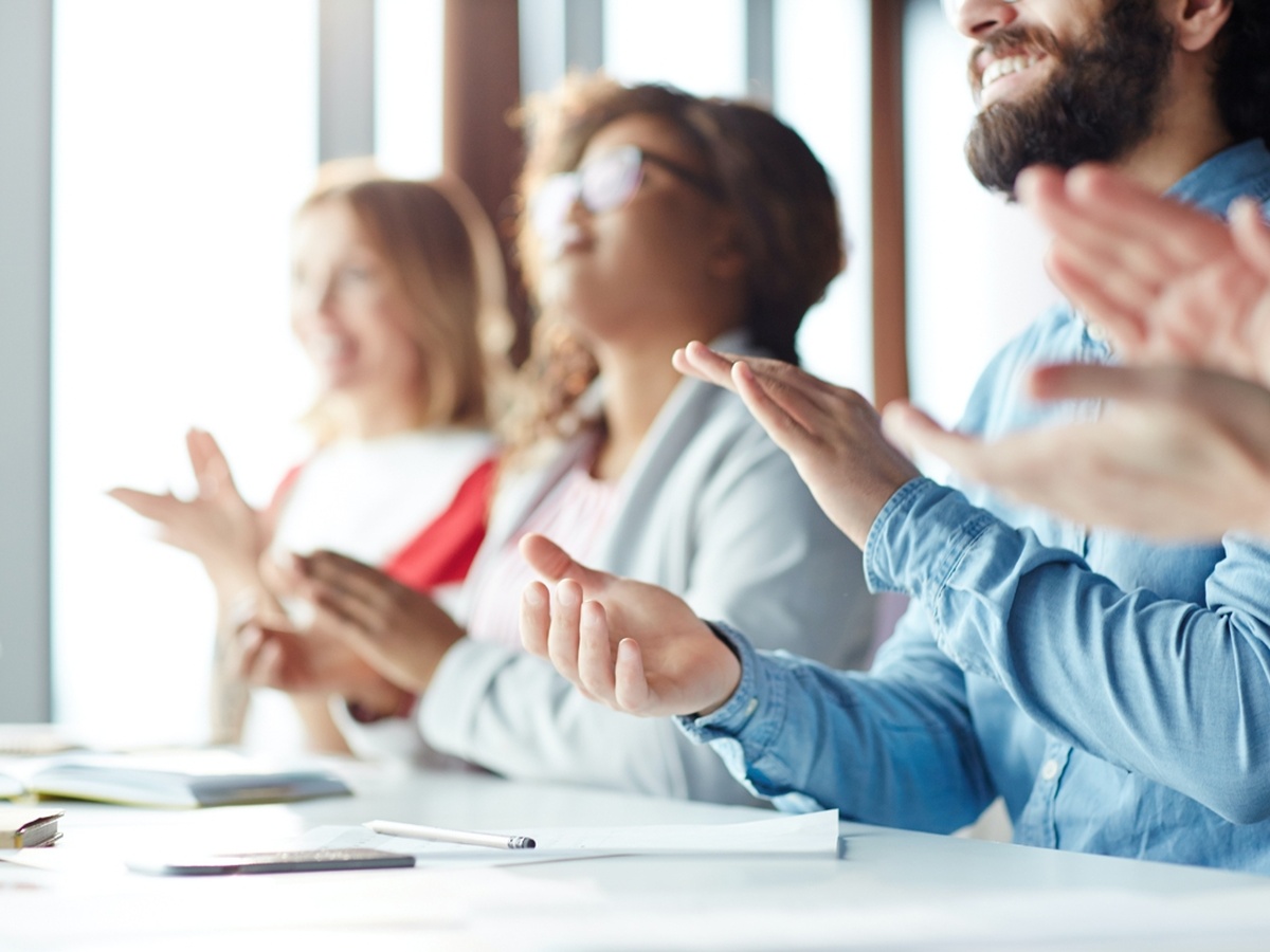 Team applauding medium